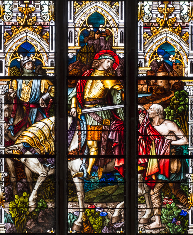 Glasfenster in der Kirche St. Nikolaus Innsbruck mit Darstellung des Hl. Martin (c) Spielmann